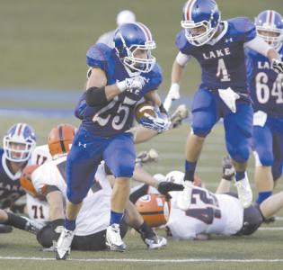 lakes anthony cistone runs for a 62 yard touchdown during the second quarter of their game with green