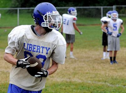 lions jarrett pfeifer runs through a drill in practice