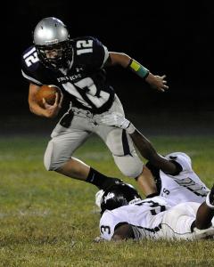 manchester valleys cody wildt breaks a tackle against forestville military ken koons photo