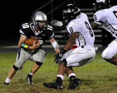 manchester valleys tommy slaysman runs with the ball against forestville ken koons photo