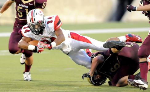 mckinley runningback jarrod smith finishes off a 35-yard run against ontario sir frederick banting