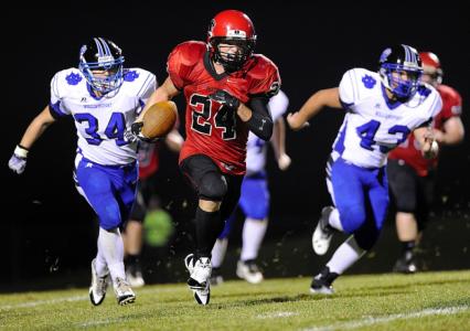 north carroll junior sean floto runs the ball against williamsport