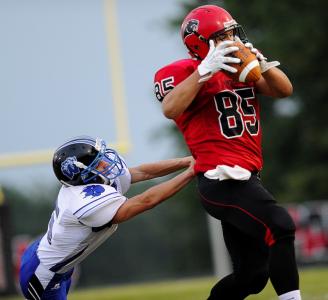 north carroll senior kyle fielder makes a catch in front of williamsports nijin shoop