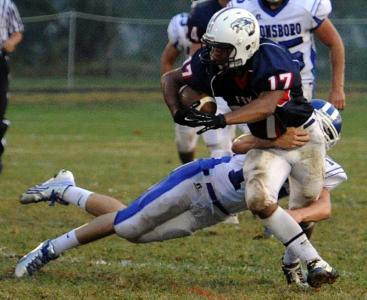 francis scott keys rye thomas tries to break a tackle against boonsboro