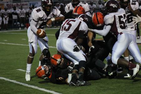 green defensive tackle mitchell kay 70 forces a fumble by maple heights josh coffee 15