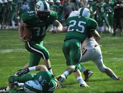 junior running back brandon berry bulls into the end zone for a 5-yard touchdown run in the first half