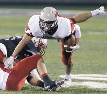 minervas dalton hartshorn looks for extra yardage during a second quarter run at alliance