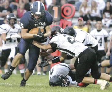 independent glenn b dettman n fairless zack kelly side steps his way around manchester defenders bobby bowen and austin klein