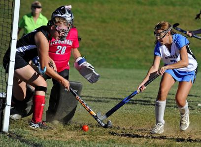 westminsters tori mcdonald fights for the ball in front of the goal with lancers hannah belski on sept 24