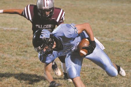 westminsters ryan hursey pulls in a pass with winters mills hunter sanders defending on oct 4