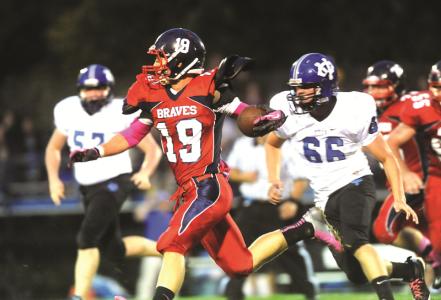 times reporter pat burk n indian valleys ryan logan eyes the first down marker during friday nights game against cvca in midvale