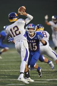 sep 20 2013  lake twp jackson quarterback tyler langenfeld gets away the pass in time to avoid the pass rush of lakes matt blasiole  ernie aranyosi  gatehouse