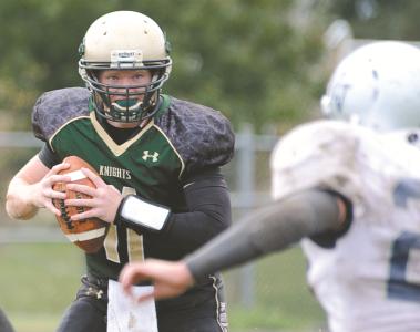 century quarterback justice guthrie looks to pass against manchester valley saturday oct 12 at century high school