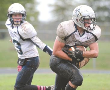 manchester valleys jake fernandez takes a handoff from brody coleman against century saturday oct 12 at century high school
