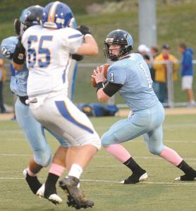 westminster quarterback duke etchison looks to pass against liberty saturday oct 12 at mcdaniel college in westminster