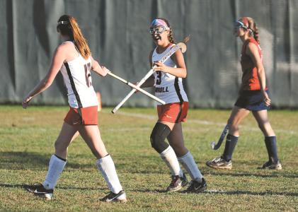 north carroll sophomore jensyn koontz left congratulates junior molly pickard after she scored a goal in the second half of the panthers 3-0 win over fsk in hamsptead monday oct 14 2013