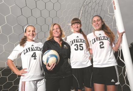 from left south carroll sophomore casey ebeling her mother jv soccer coach sandy ebeling freshman natalie karukas and her sister junior nicole karukas have all been touched by breast cancer