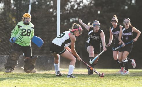 centurys mandi trostle 9 shoots the game-winning goal as winters mill goalie lindsay chiavacci defends