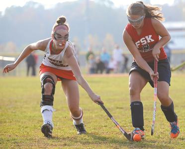 north carroll senior megan heindel left and fsk senior autumn nelson battle for control of the ball in the second half of their playoff game in hampstead wednesday october 30 2013