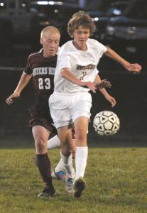 winters mills ben chase and south carrolls kevin morris battle for the ball