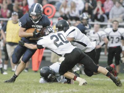 independent glenn b dettman n fairless zack kelly takes a hit from manchesters bobby bowen in regular season play this year