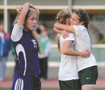 centurys alyssa malanik center and melanie bell celebrate after the knights second goal against loch raven in the 2a state championship game at umbc in baltimore friday nov 15