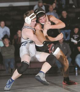 machester valleys logan hull wrestles winters mills lucas kirby during their 160-pound bout in westminster wednesday dec 11 2013