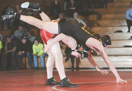 north carrolls brice hardesty flips south carrolls kc stipkak off his back during their 138-pound bout in hampstead thursday jan 16 2014