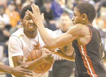 repository bob rossiter n massillons terrance block is fouled by mckinleys juleo patterson during the second quarter