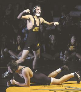 south carrolls kyle garrett reacts after pinning winters mills jimmy guercio during their 152-pound bout to win the match in winfield for south carroll thursday night jan 23 2014