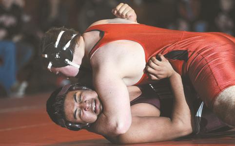 north carrolls tyler carney pins winters mills christian olvera in their 285-pound bout in hampstead monday jan 27 2014