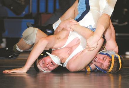 libertys joe kuegler wrestles catoctins garrett buckley during their 132-pound match in williamsport saturday march 1