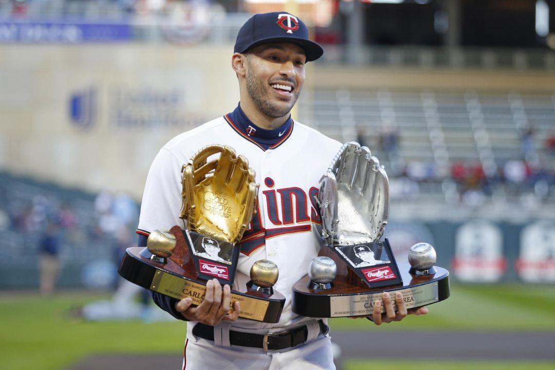 FILE Minnesota Twins Carlos Correa walks off the field with his