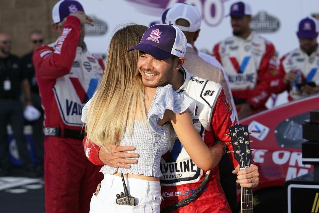 Kyle Larson hugs his wife, Katelyn Sweet, after winning a NASCAR Cup Series  auto race Sunday, June 20, 2021, in Lebanon, Tenn. (AP Photo/Mark Humphrey)  | The Courier ASSOCIATED PRESS