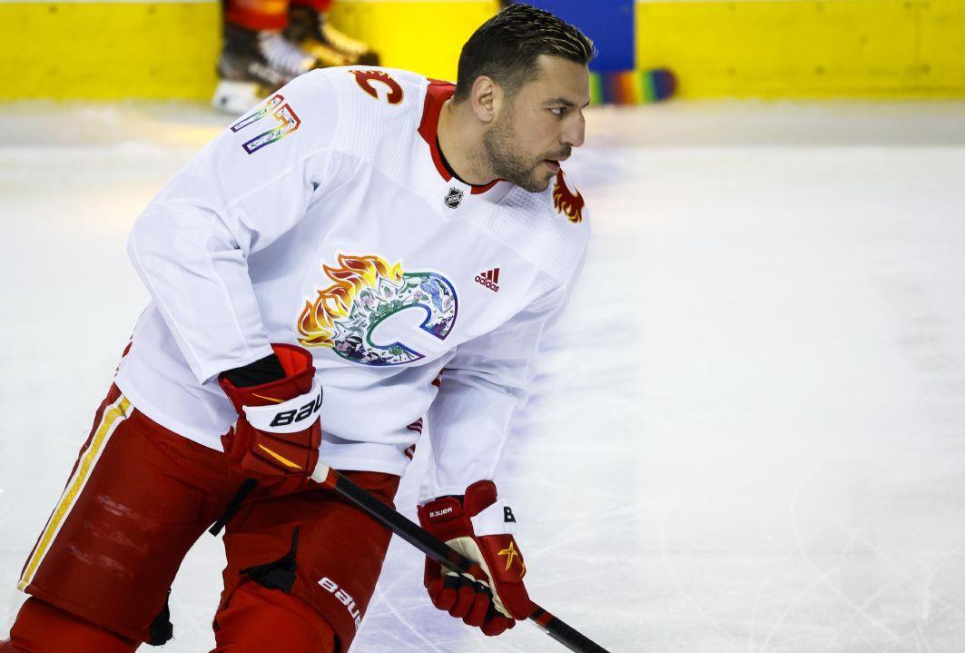Calgary Flames forward Milan Lucic wears a Pride jersey while