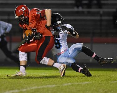 north carrolls noah kline is hit by westminsters chad patterson after hauling in a pass for first down yardage friday oct 24 in hampstead