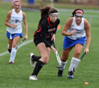 north carrolls mackenzie poist races walkersvilles alli mori to the ball wednesday oct 29 at walkersville high school