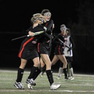 annapolis md-11314-l-r north carroll 15 holly mays and teammate 9 mackenzie poist celebrate a second half goal as they would win 5-1 and advance to the state finals loch raven vs north carroll girls high school field hockey at broadneck hs   llo