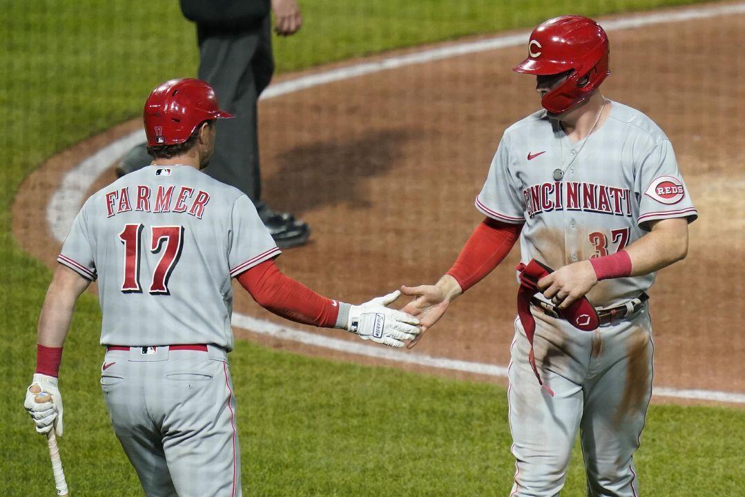 Kyle Farmer of the Cincinnati Reds bats during the game against