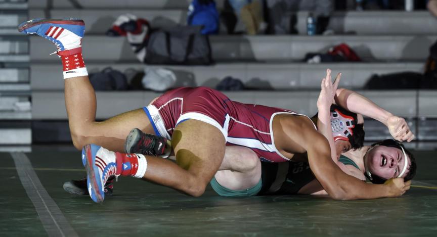 fsks cj goon wrestles centurys cody davis during their 170-pound bout in eldersburg wednesday jan 14 2015