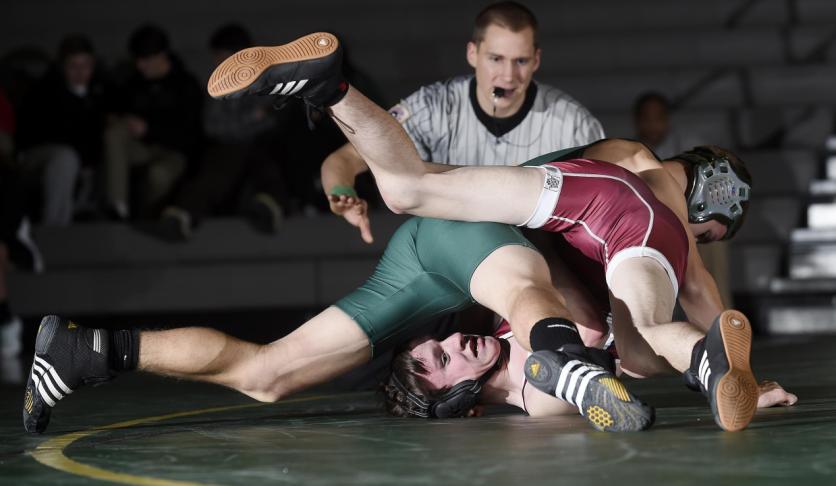 centurys nathan haerbig wrestles fsks andy lash bottom during their 120-pound bout in eldersburg wednesday jan 14 2015