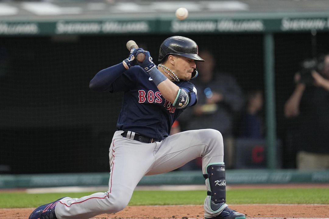 Boston Red Sox's Enrique Hernandez dunks away from a low pitch in
